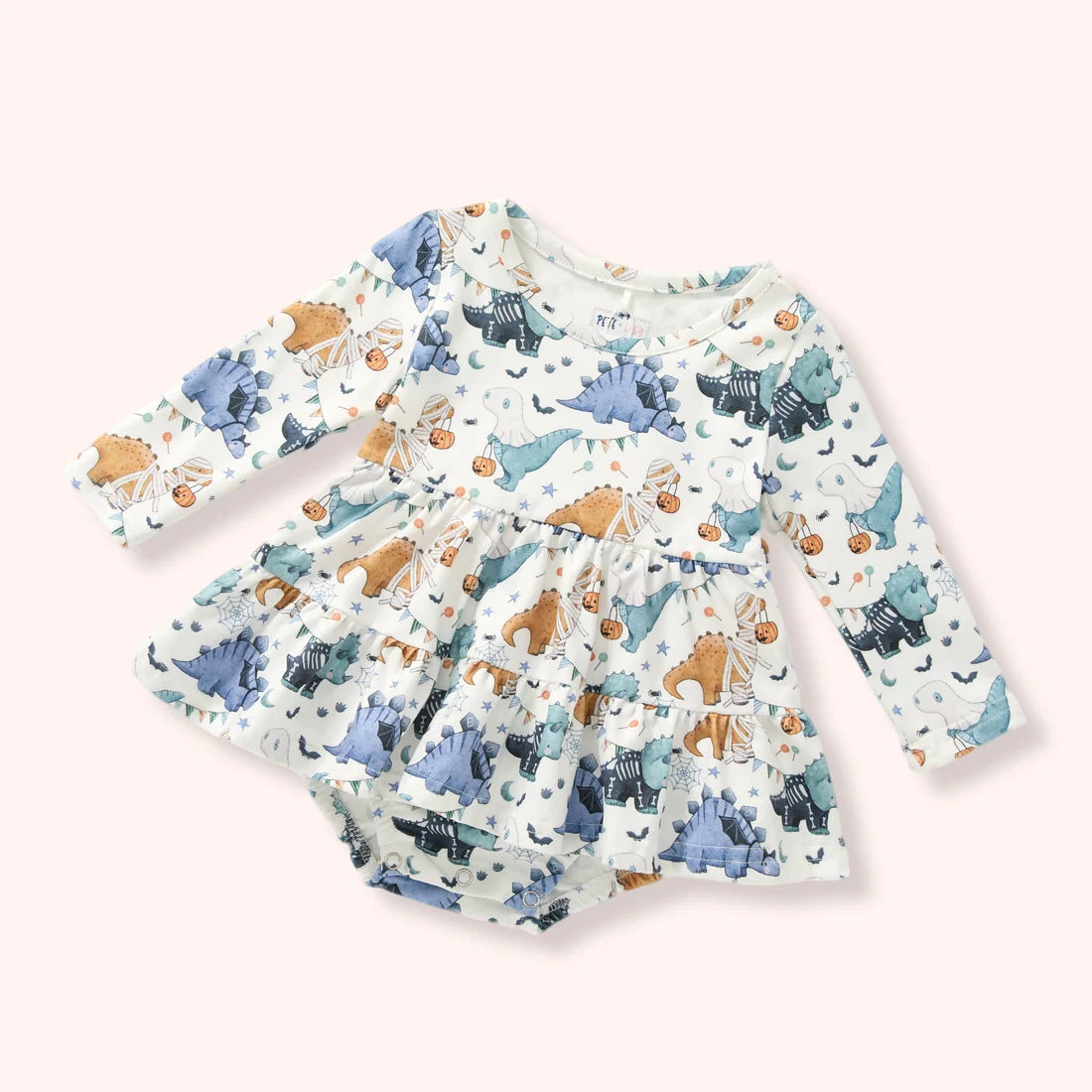 Baby girls cream Halloween dinosaur skirted bubble with long sleeves, ruffled skirt and snap bottom.