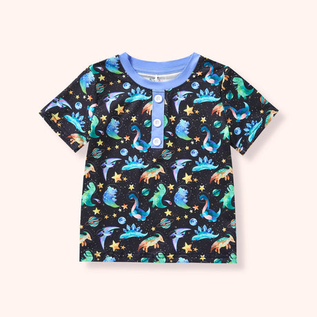 Kids short sleeve t-shirt with colorful dinosaur and outer space print on a black background, featuring stars, planets, and playful details