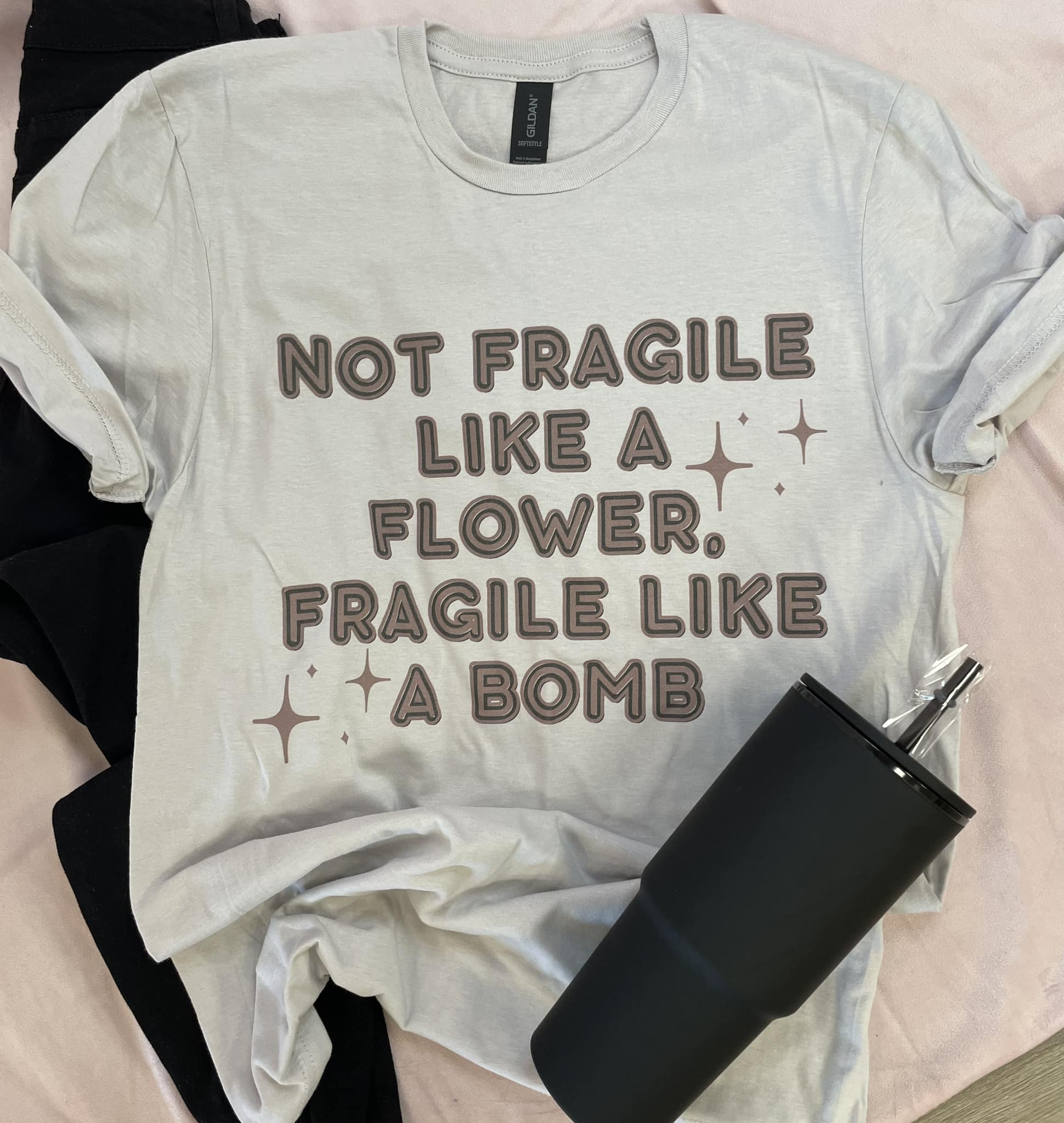 Not Fragile Like a Flower, Flower Like A Bomb Graphic Tee