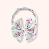 Rainbow Showers Bow Headband | Pete + Lucy