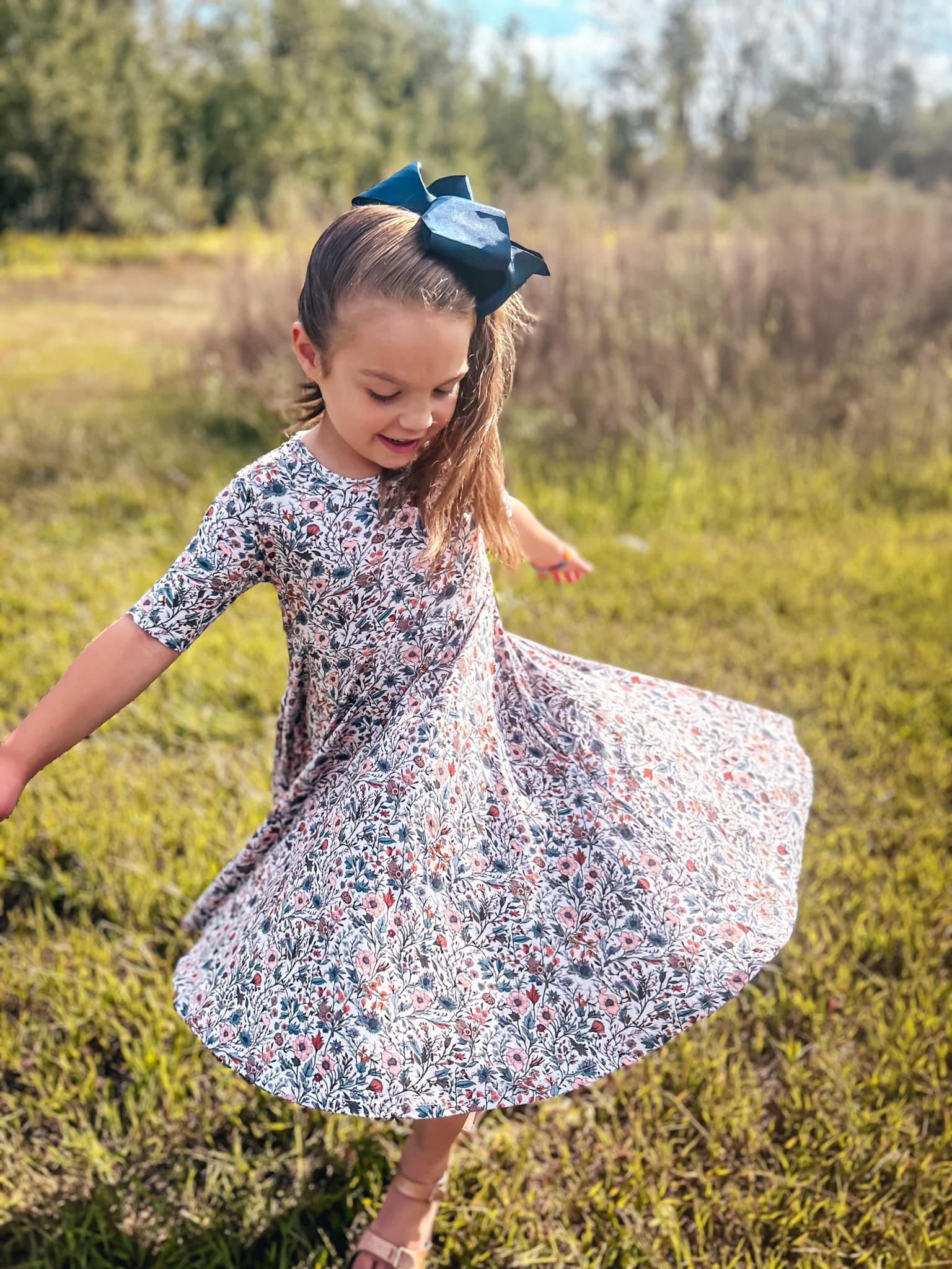 Muted Floral Twirl Dress by Landrie Lou