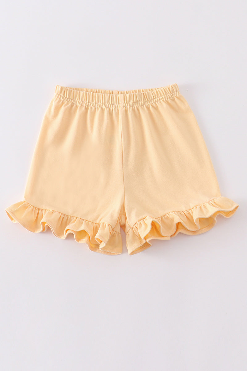 Soft Yellow Ruffle Shorts by Abby & Evie