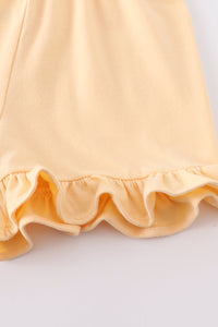 Soft Yellow Ruffle Shorts by Abby & Evie