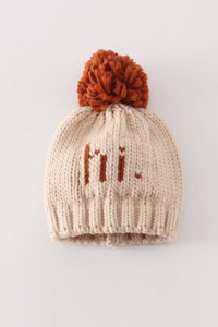 Cozy Beige “Hi” Knit Pom-Pom Beanie Hat by Abby & Evie