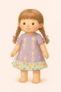 Illustrated doll wearing a purple giraffe-print dress with floral trim, on a soft pale pink background.