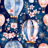Close-up of navy fabric featuring pastel hot air balloons with floral accents and soft decorative details.