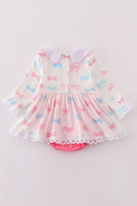 Petite Bows Parade Skirted Baby Romper by Abby & Evie