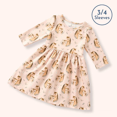 Blush pink mare-and-foal print dress with 3/4 sleeves and a softly gathered twirl skirt.
