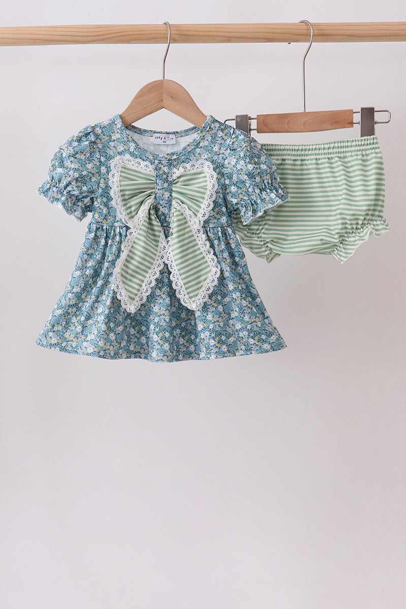 blue floral bloomer set with puff sleeves, an oversized sage-striped lace bow, and matching striped ruffle bloomers.