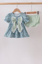 blue floral bloomer set with puff sleeves, an oversized sage-striped lace bow, and matching striped ruffle bloomers.
