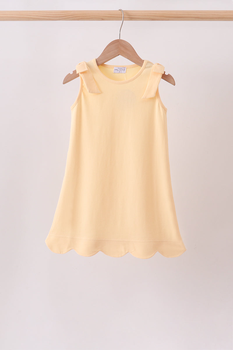 Buttercup Scalloped Bow Dress for girls with shoulder bows and soft cotton fabric
