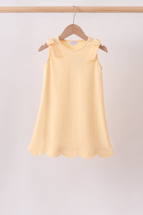 Buttercup Scalloped Bow Dress for girls with shoulder bows and soft cotton fabric