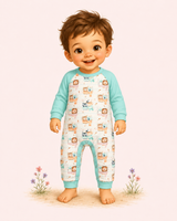 Illustrated toddler wearing a white romper with mint raglan sleeves and cuffs, soft woodland print, and barefoot storybook charm.