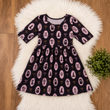 Dark charcoal dress with pink cat cameos, pumpkins, bows and tiny gold Halloween details.
