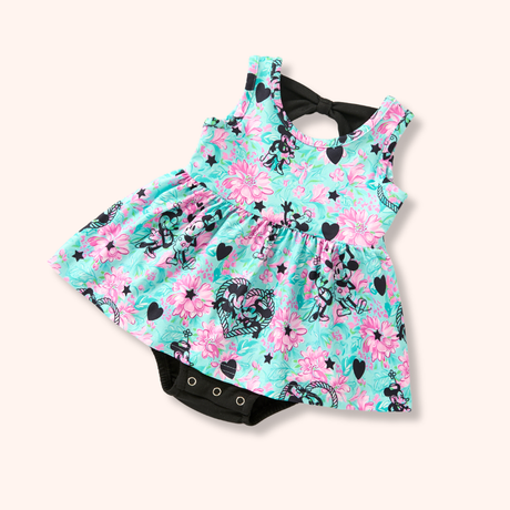 Mint sleeveless skirted bubble with pink floral print, black hearts, mouse silhouettes, black bow, and snap closure.