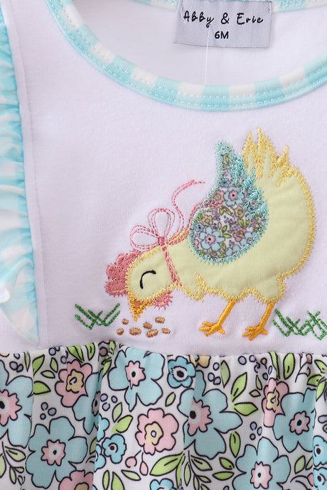     Close-up of the Peep + Petals baby bubble showing the embroidered yellow chick appliqué with floral wing, pink bow, and pastel floral fabric.