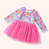 Lavender long sleeve dress with pastel pumpkin print and bright pink tulle skirt.