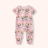 Pink short-sleeve zip pajama romper with cuffed ankles, pandas, sleepy cats, moons, stars, diamonds and “Good Night” print.