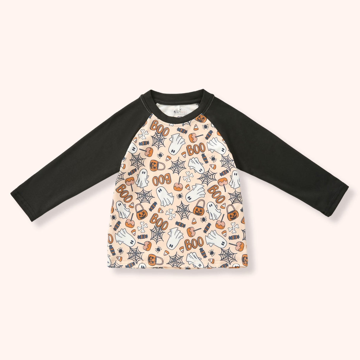 Peach raglan tee with black sleeves and an allover Halloween print of ghosts, pumpkins, candy, webs and “BOO.”