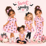 Four storybook illustrated children modeling matching pink Halloween-themed pajamas and dresses with a pumpkin and bat print, posed with pumpkins and a decorative 'Sweet Spooky Collection' sign on a light pink background.