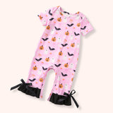 Pink Halloween-themed baby romper with pumpkins, bats, and ghosts on a white background.