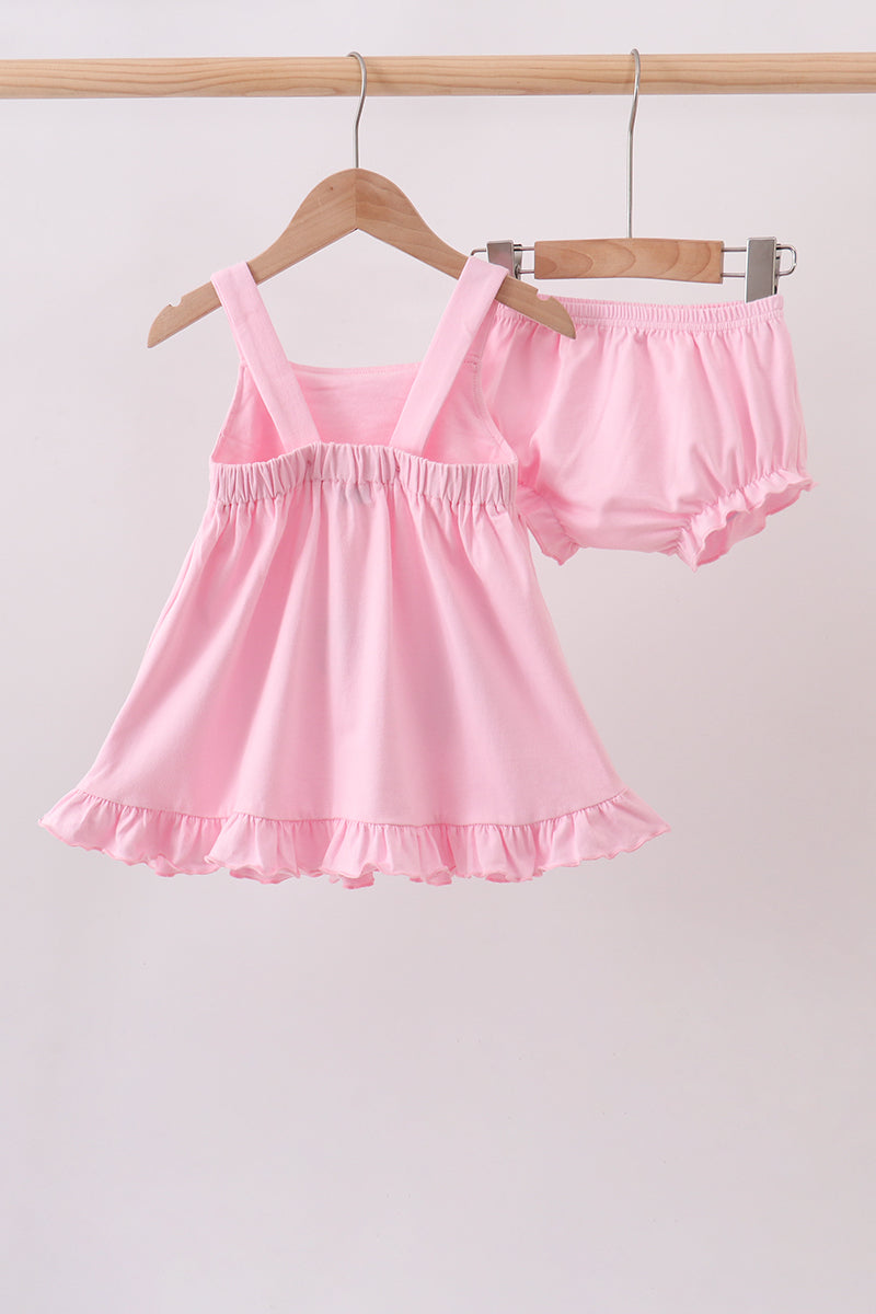 pink football bloomer set with a ruffled sleeveless top, football appliqué pockets, and matching ruffle-trim shorts.