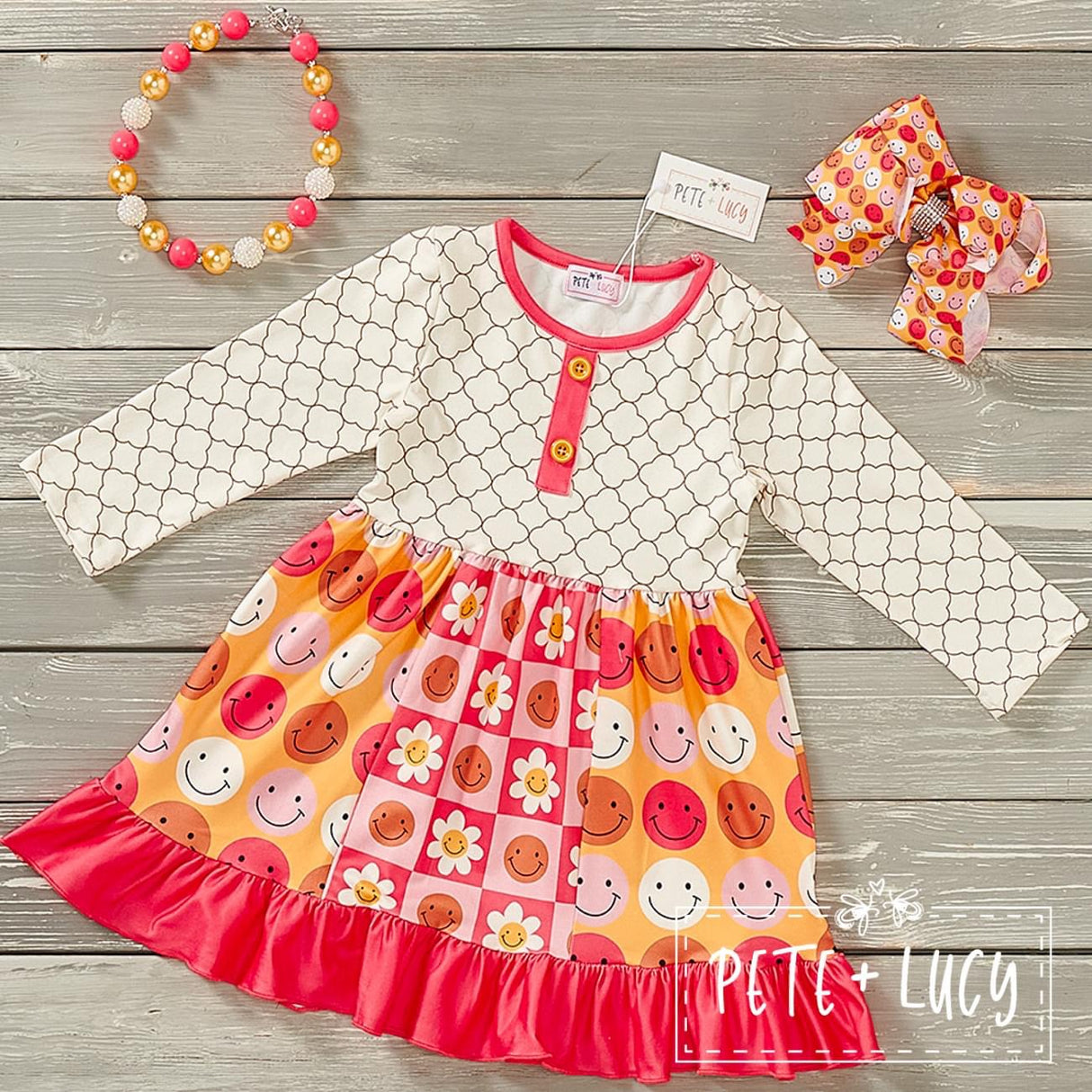 Smiley Faces Dress by Pete and Lucy