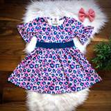 Bright Leopard Twirl Dress by Wellie and Kate